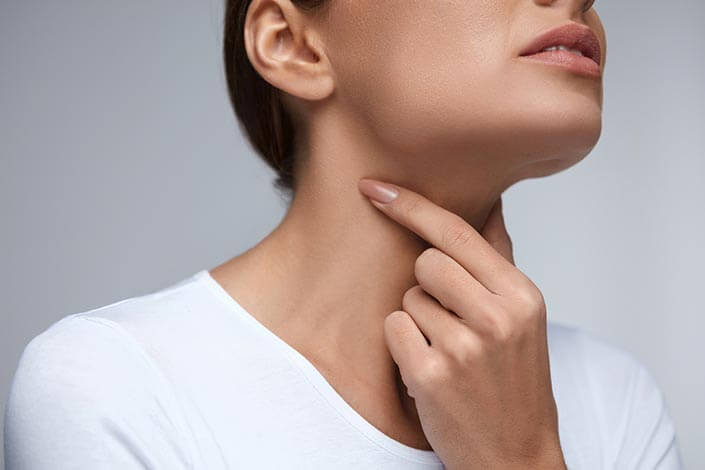 Woman Experiencing Neck Pain